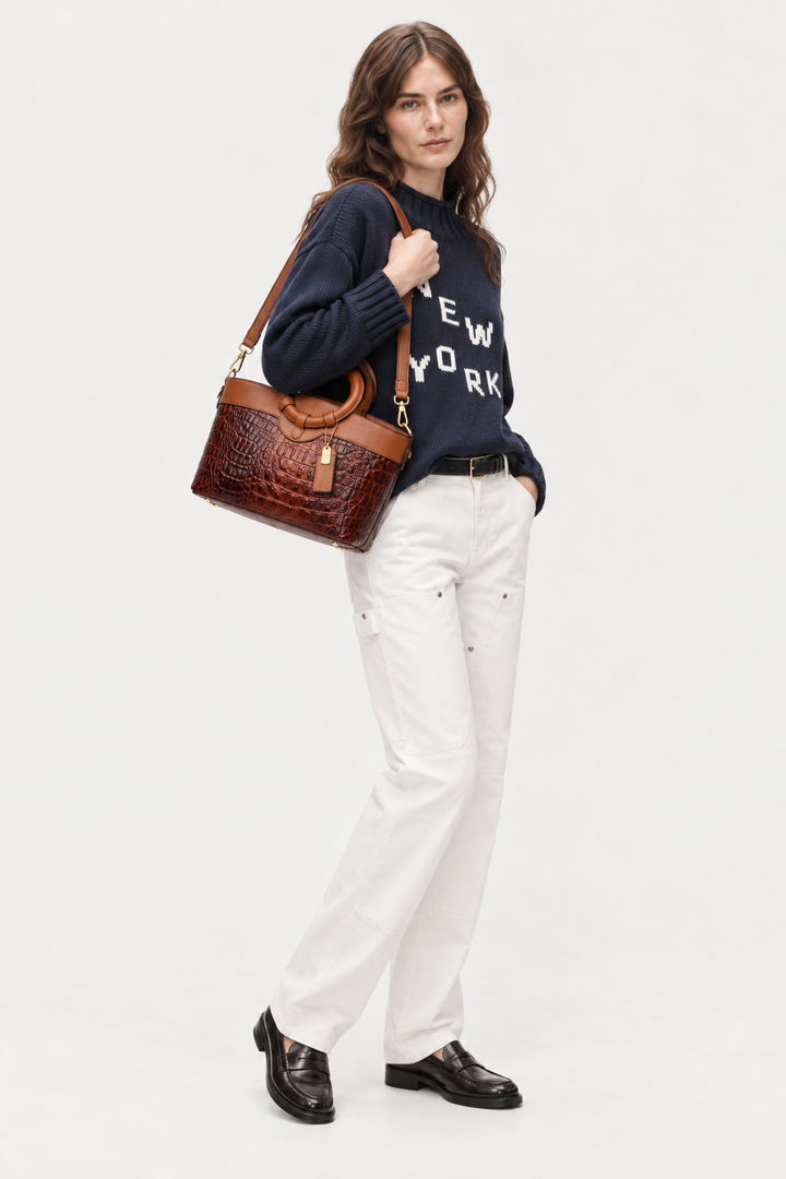 Crocodile-embossed circular handle bag