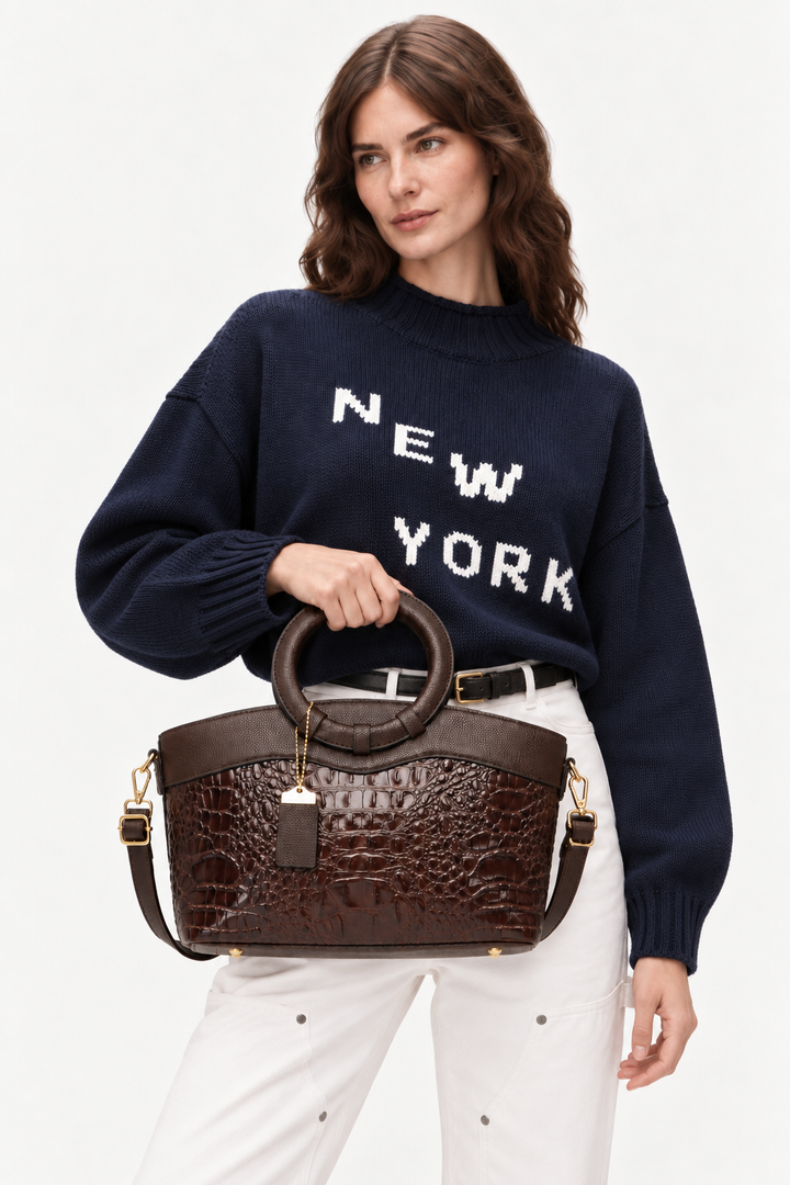 Crocodile-embossed circular handle bag