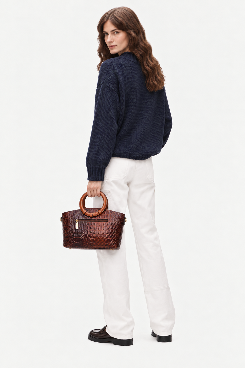 Crocodile-embossed circular handle bag